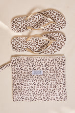 Leopard printed flip-flops
